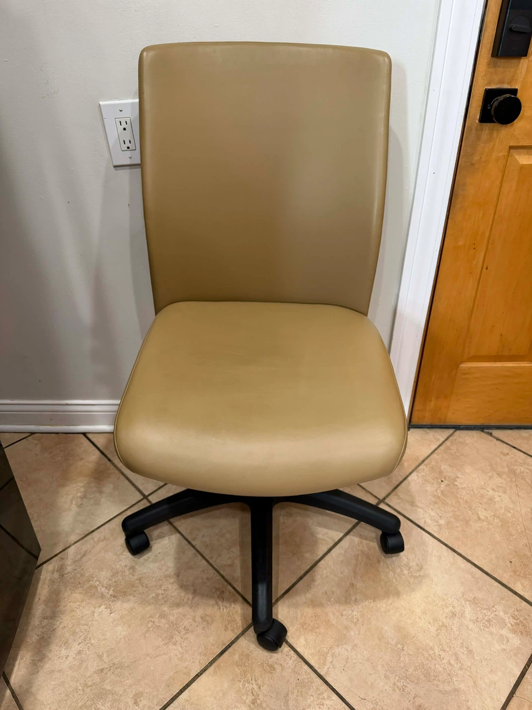 Tan Armless Rolling Office Chair