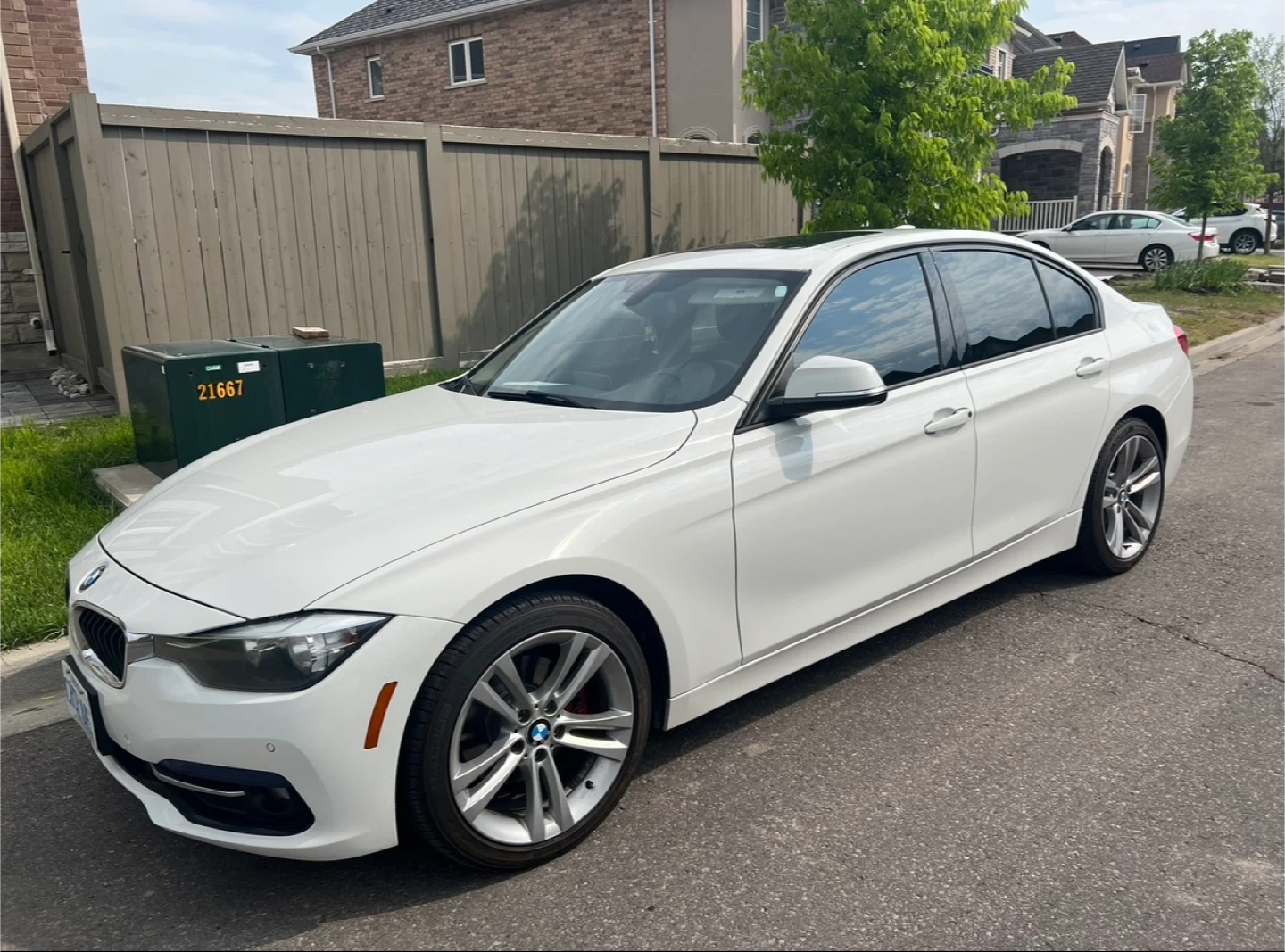 White BMW 320i Sedan