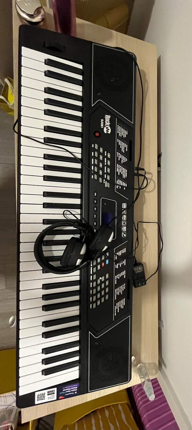 Keyboard with Headphones and Stand