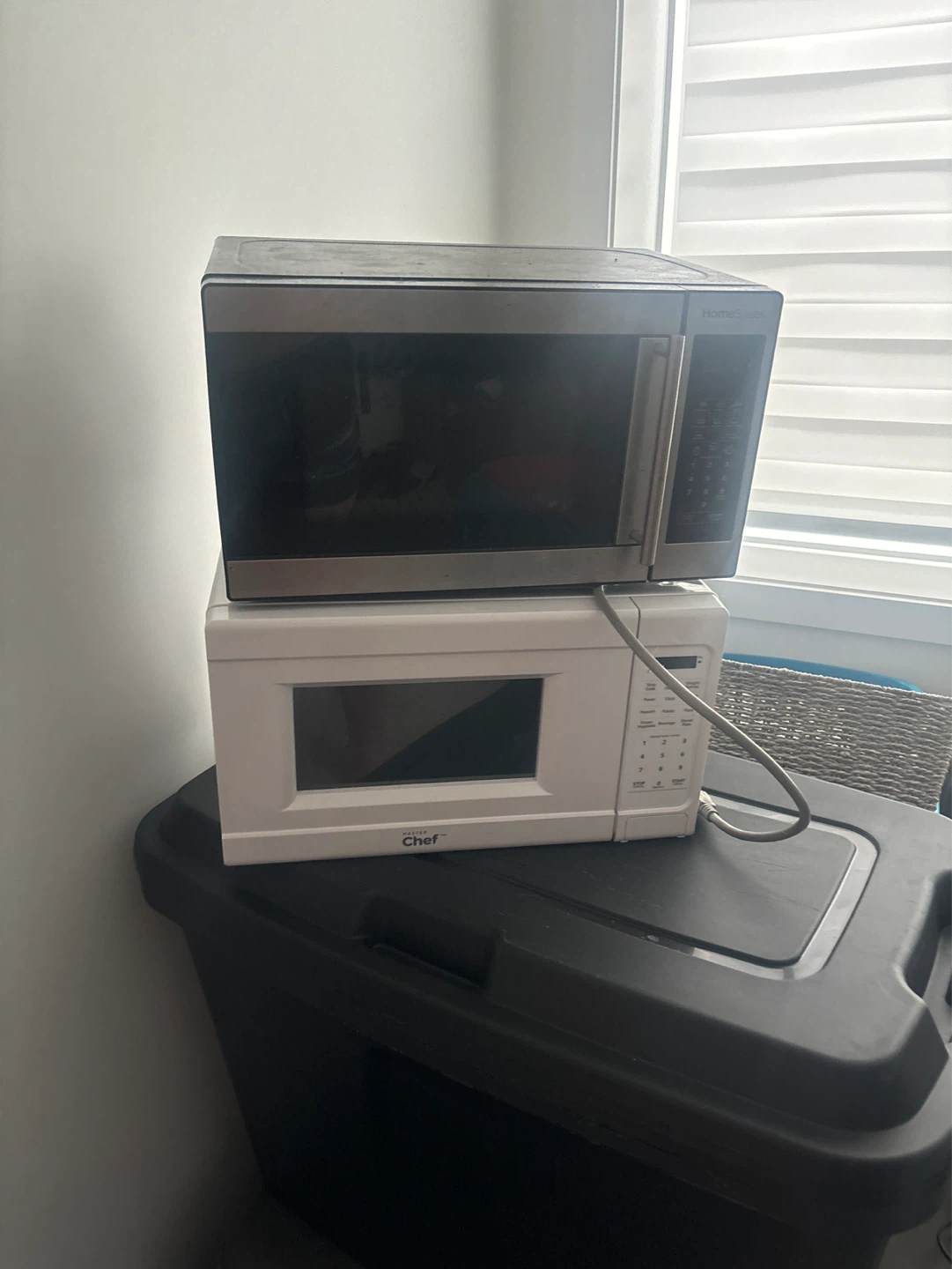 Two microwaves just collecting dust