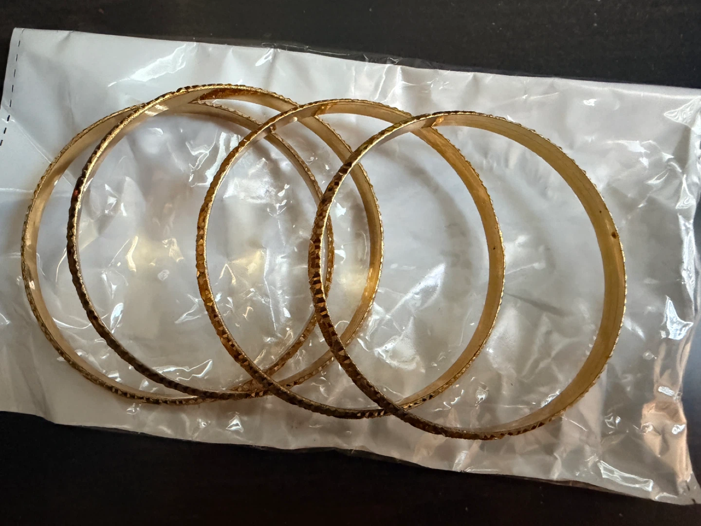 Set of 4 Gold Tone Bangle Bracelets