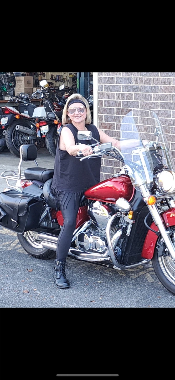 Red Honda Cruiser Motorcycle with Saddlebags
