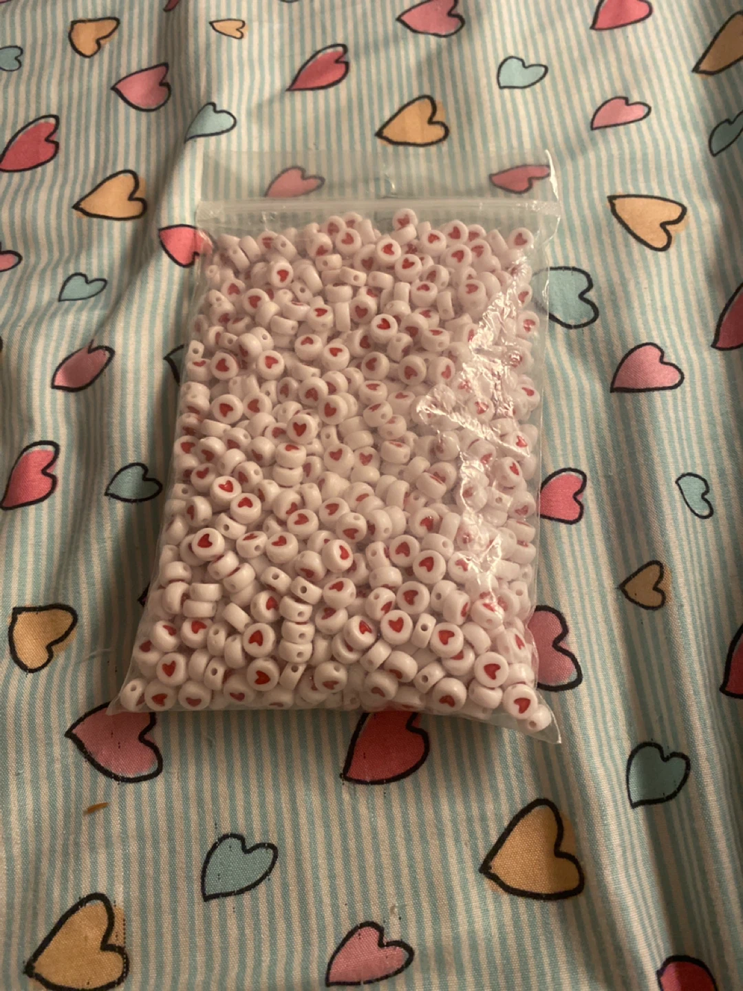 Bag of White Heart Beads