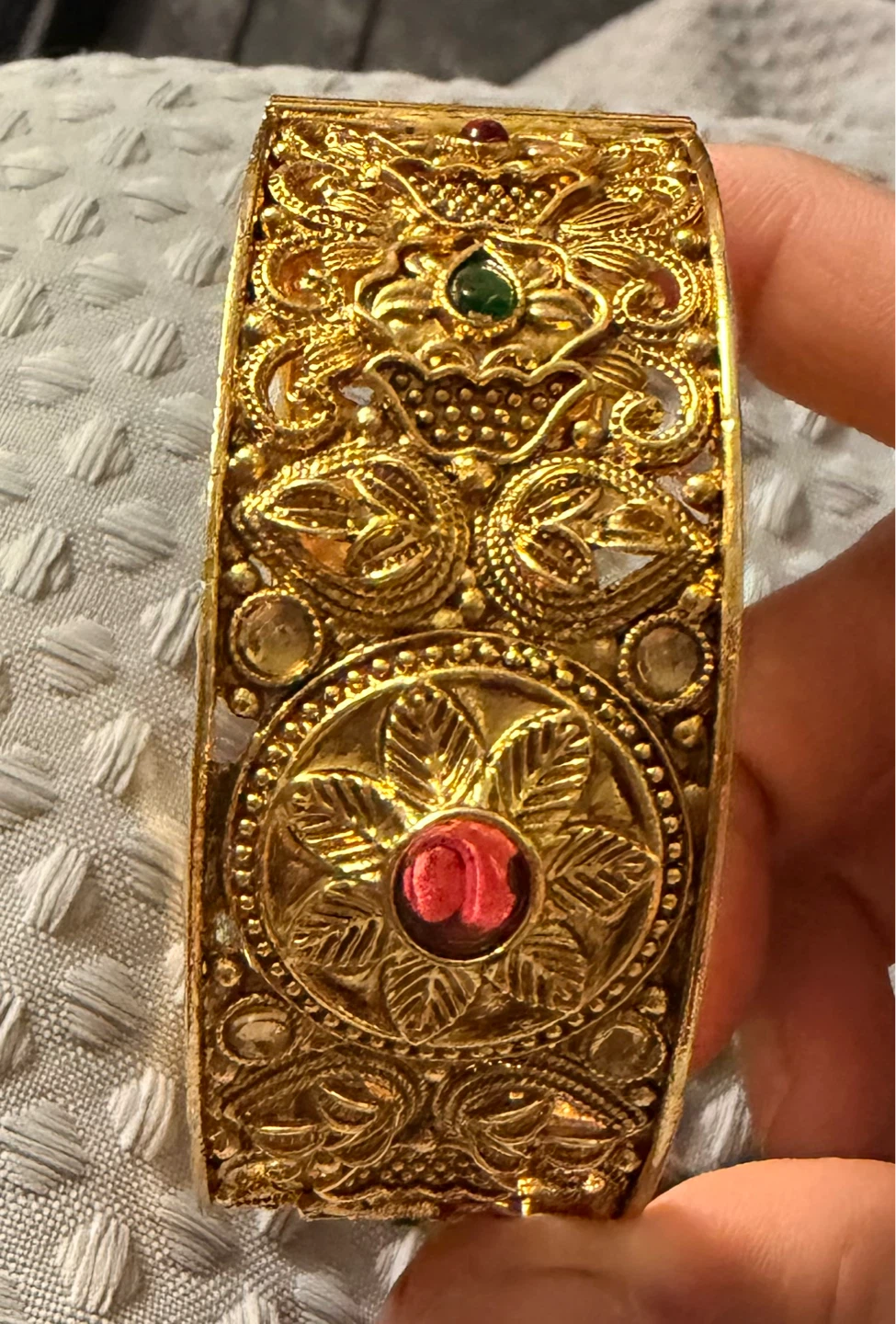 Gold Tone Bangle with Red and Green Stones