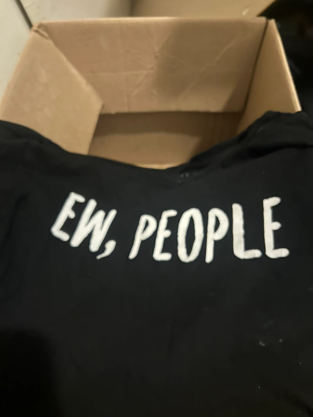 Black T-shirt with "EW, PEOPLE" graphic