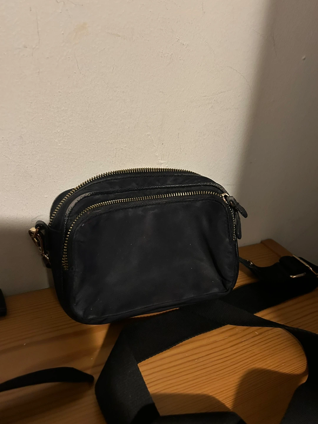 Black crossbody bag with double zipper