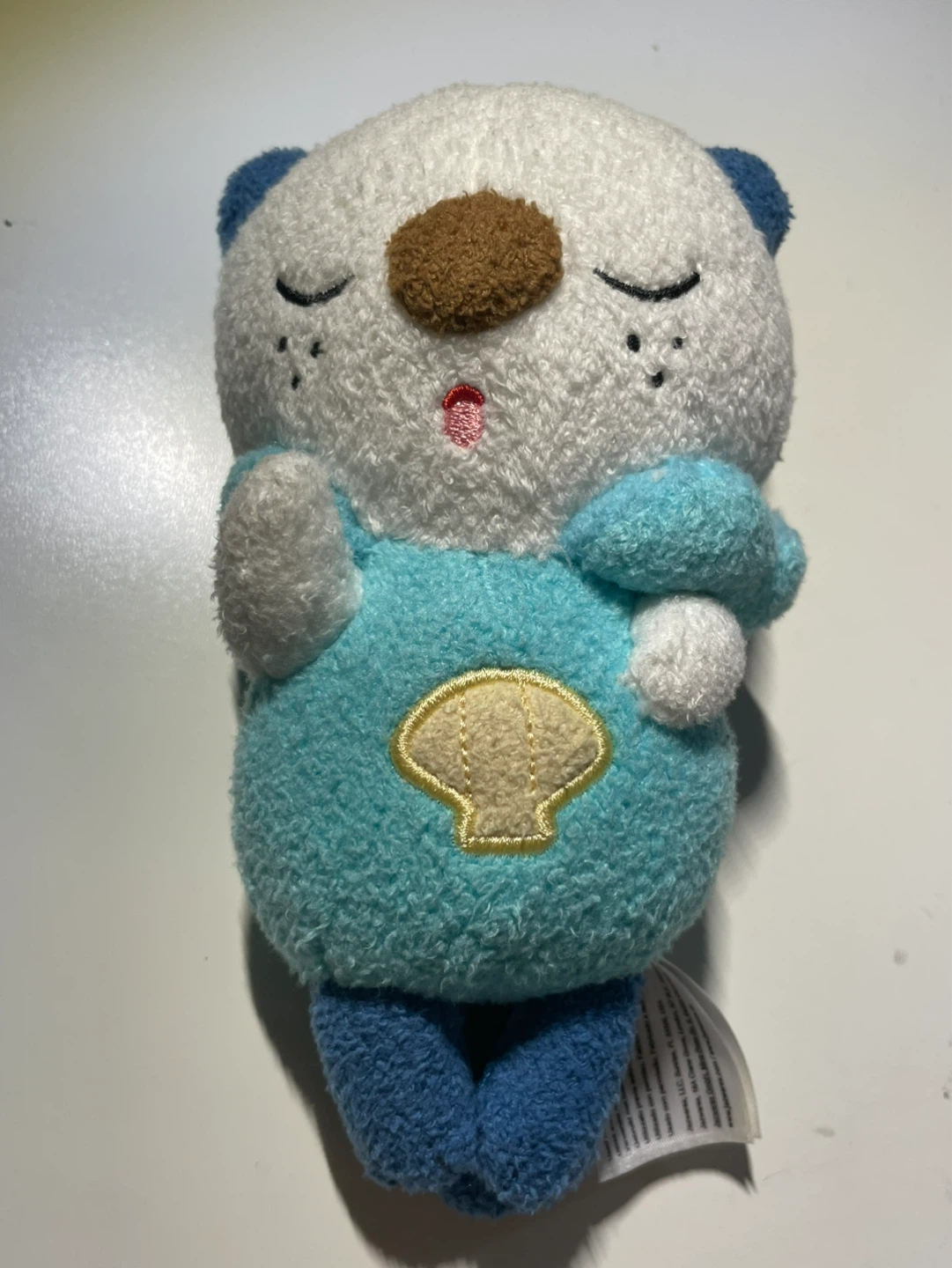 Oshawott sleeping plushie