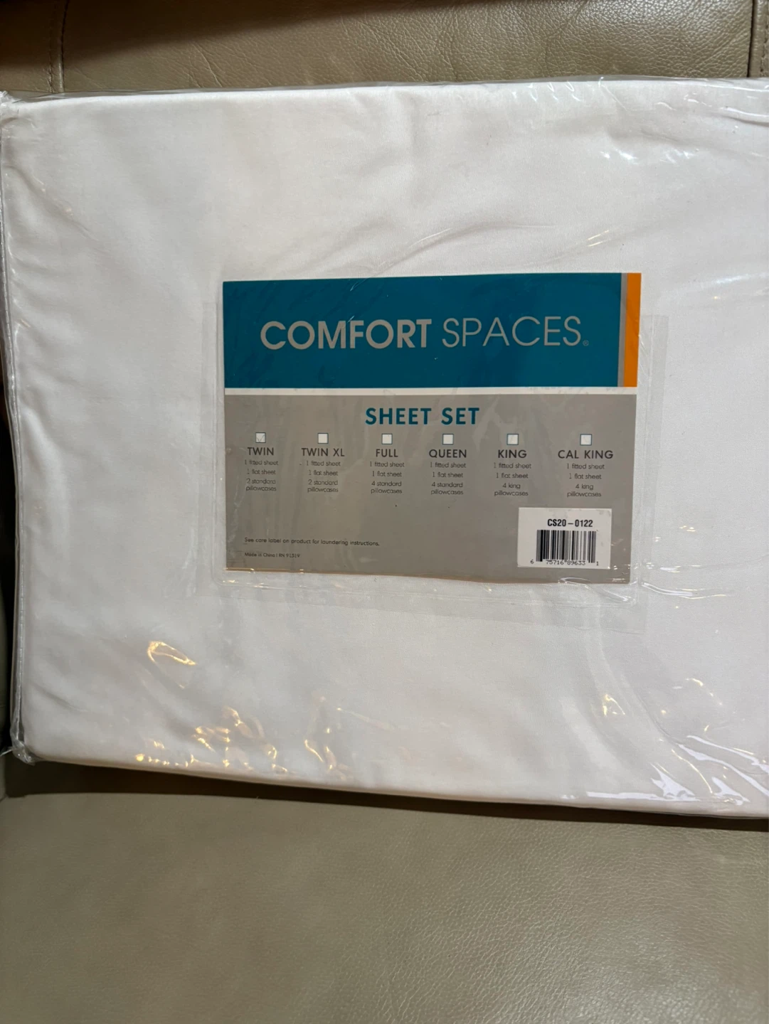Twin size white fitted and flat sheet set with 2 pillow cases.
