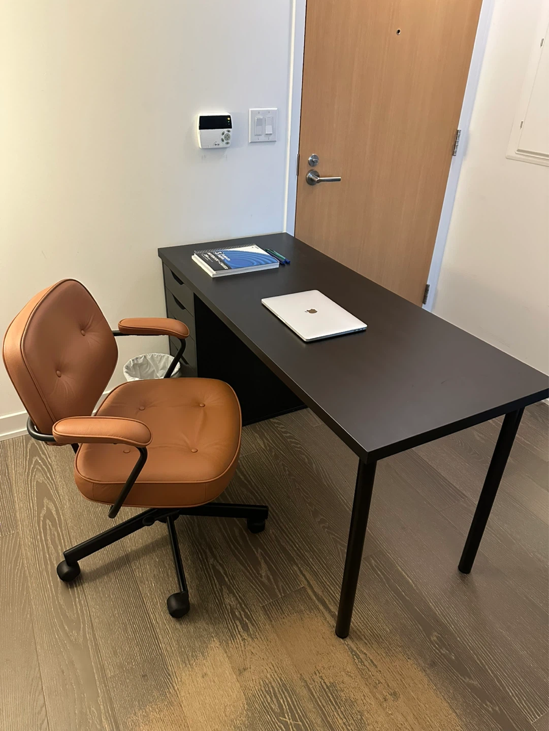Brown Leather Office Chair and black table