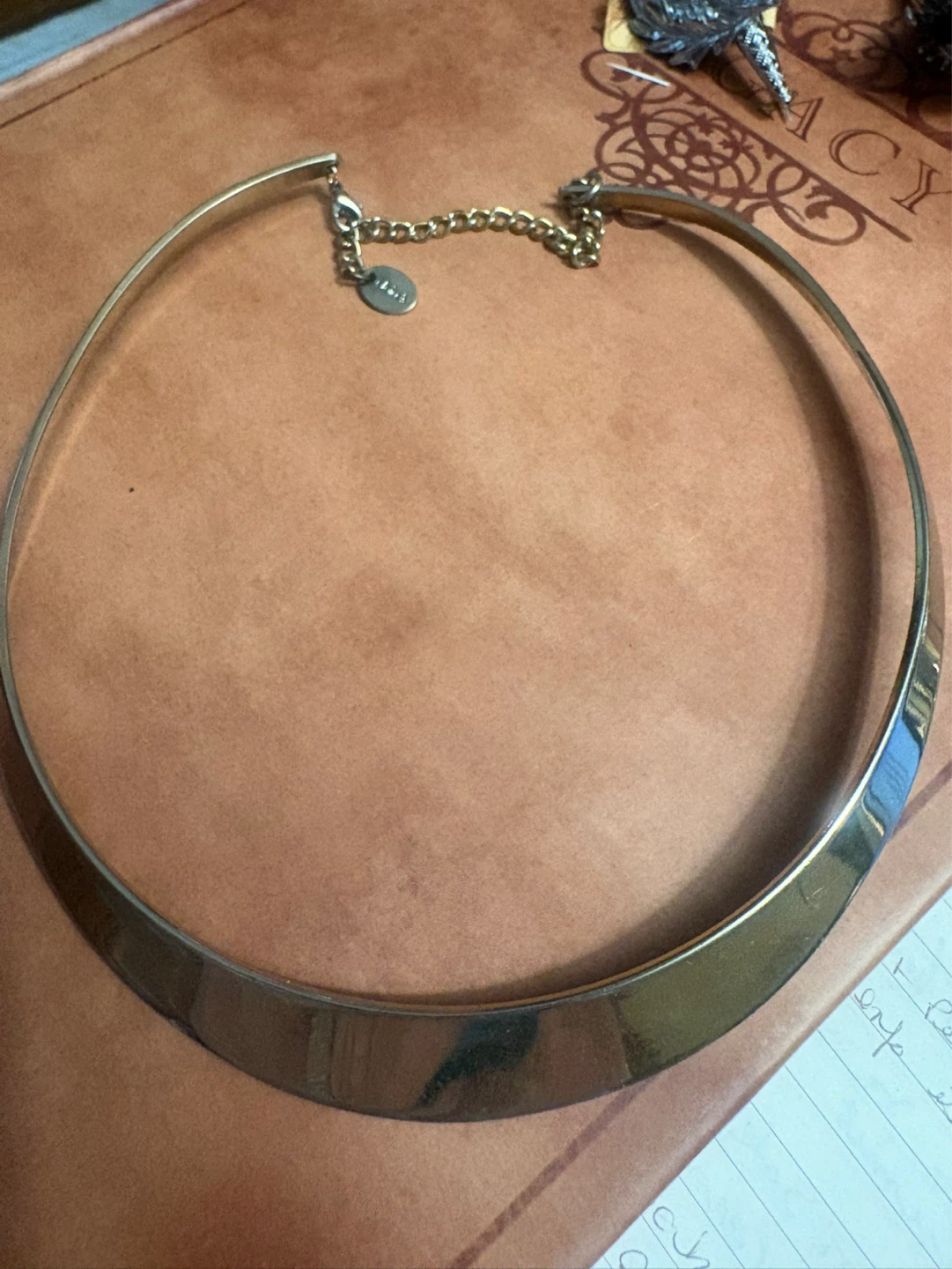 Gold tone choker necklace