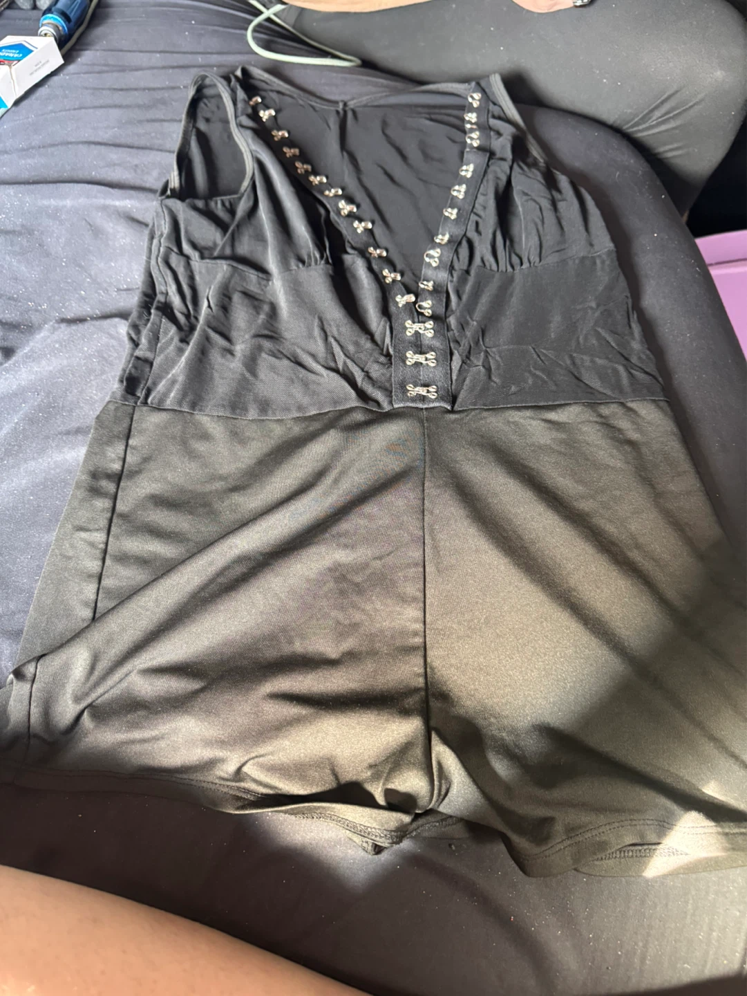 Black romper with hook and eye closure