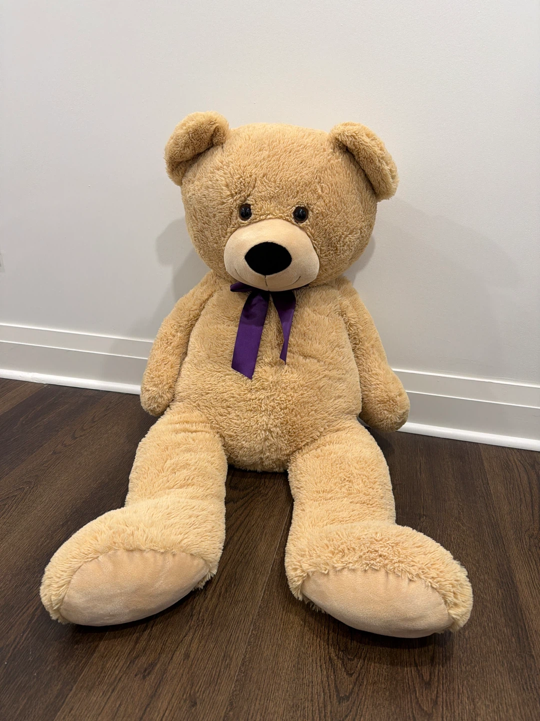 Large Teddy Bear with Purple Ribbon