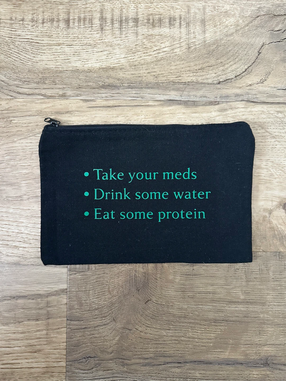 Black Pouch with health reminders