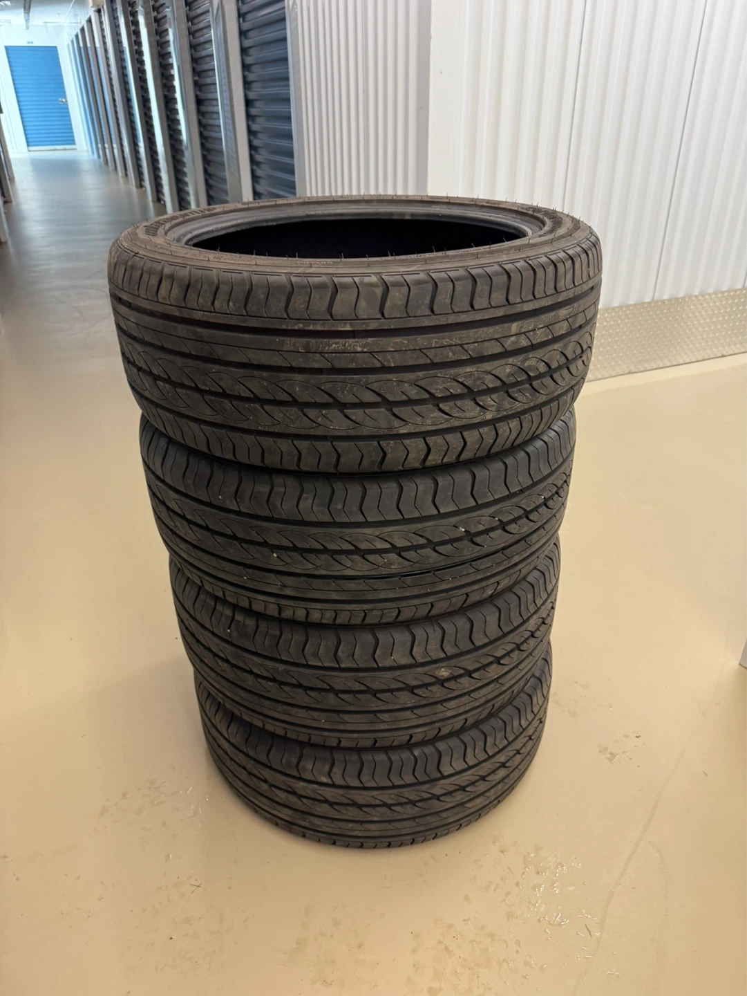 All season 235/45 ZR18 tires, barely used.
