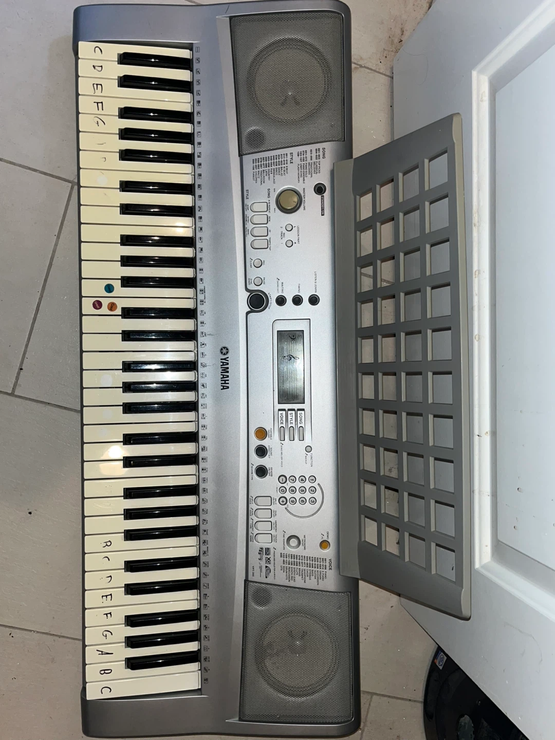 Yamaha Keyboard with Stand and piano books