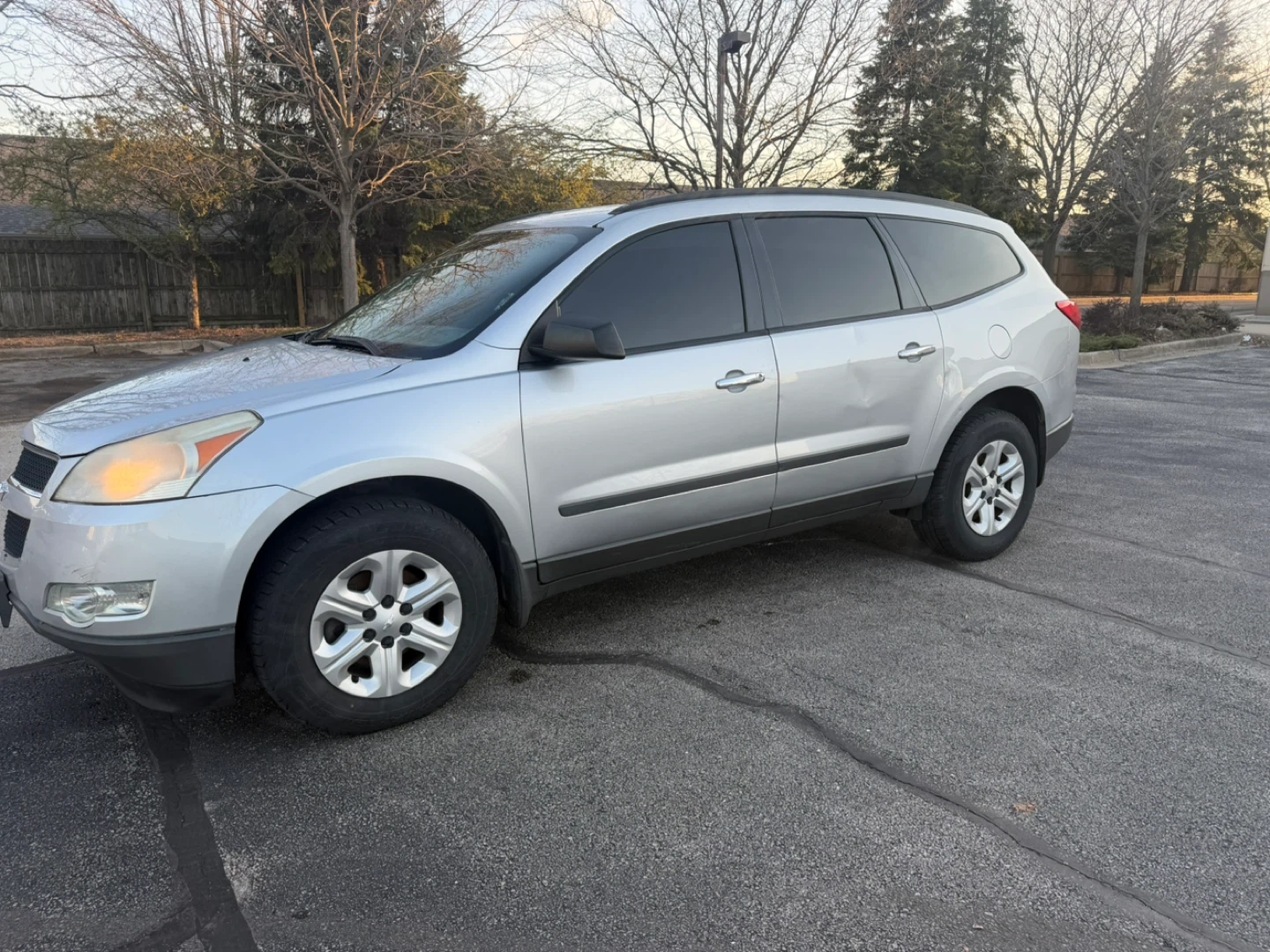 Silver Chevrolet Traverse SUV - photo 5