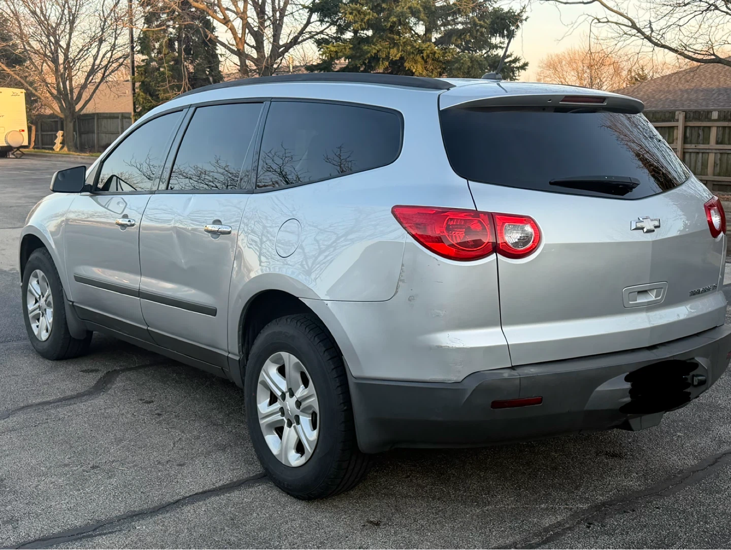 Silver Chevrolet Traverse SUV - photo 3