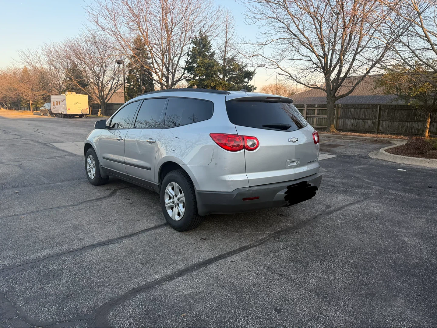 Silver Chevrolet Traverse SUV - photo 4
