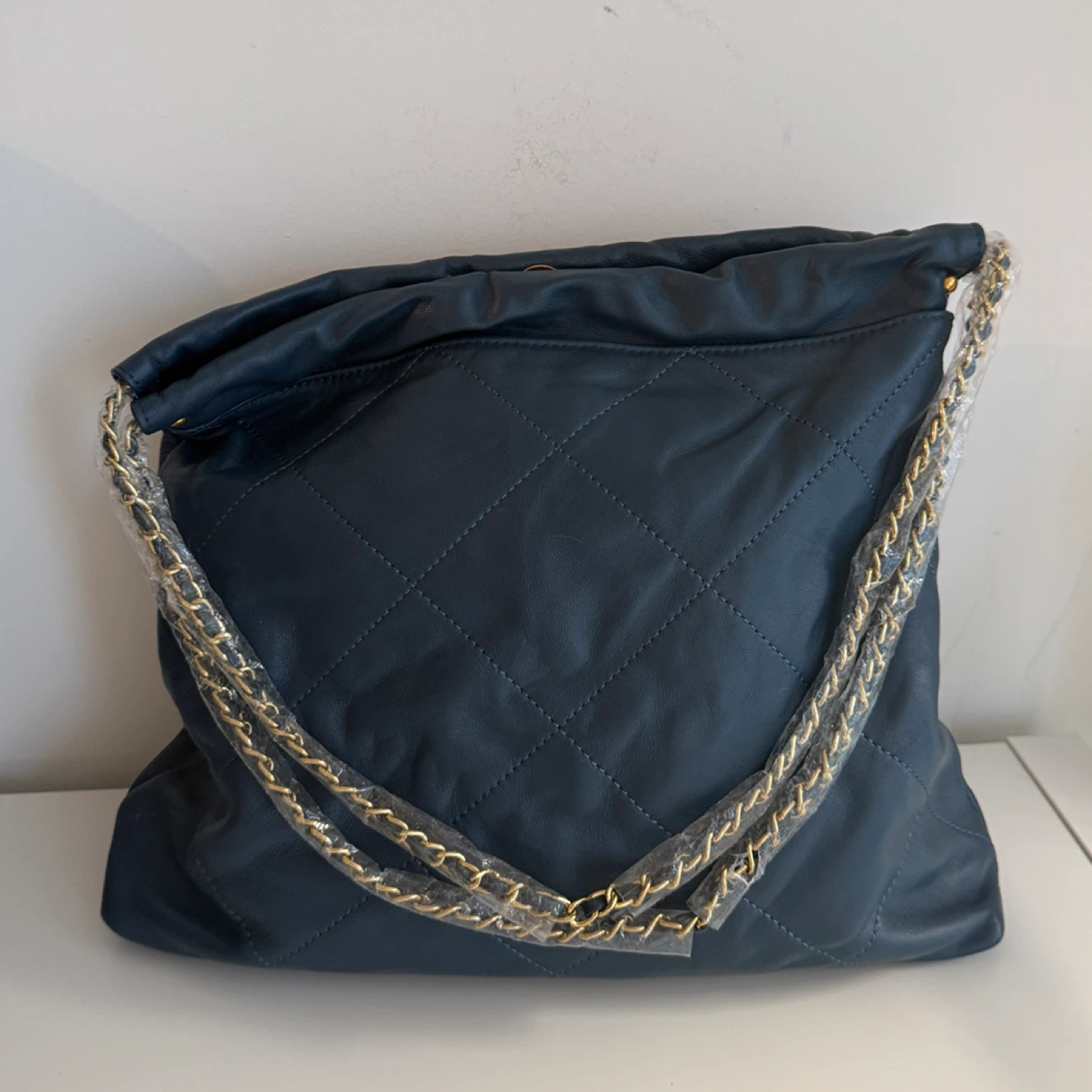 Navy quilted leather hobo bag