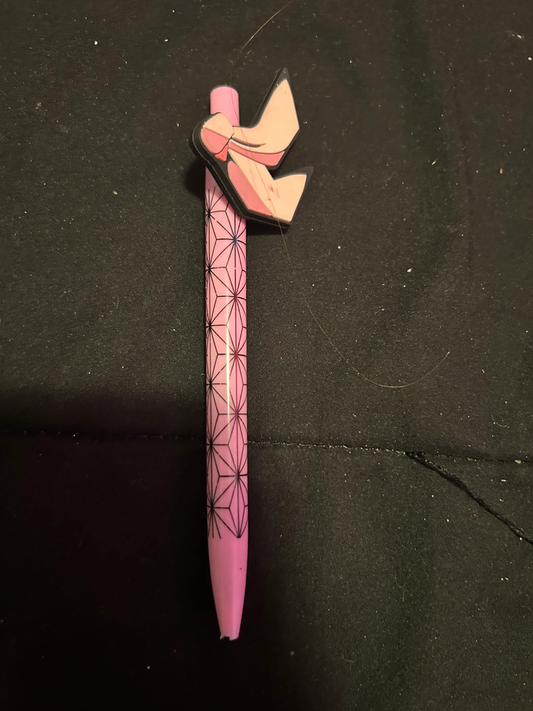 pink nezuko themed pen with bow charm
