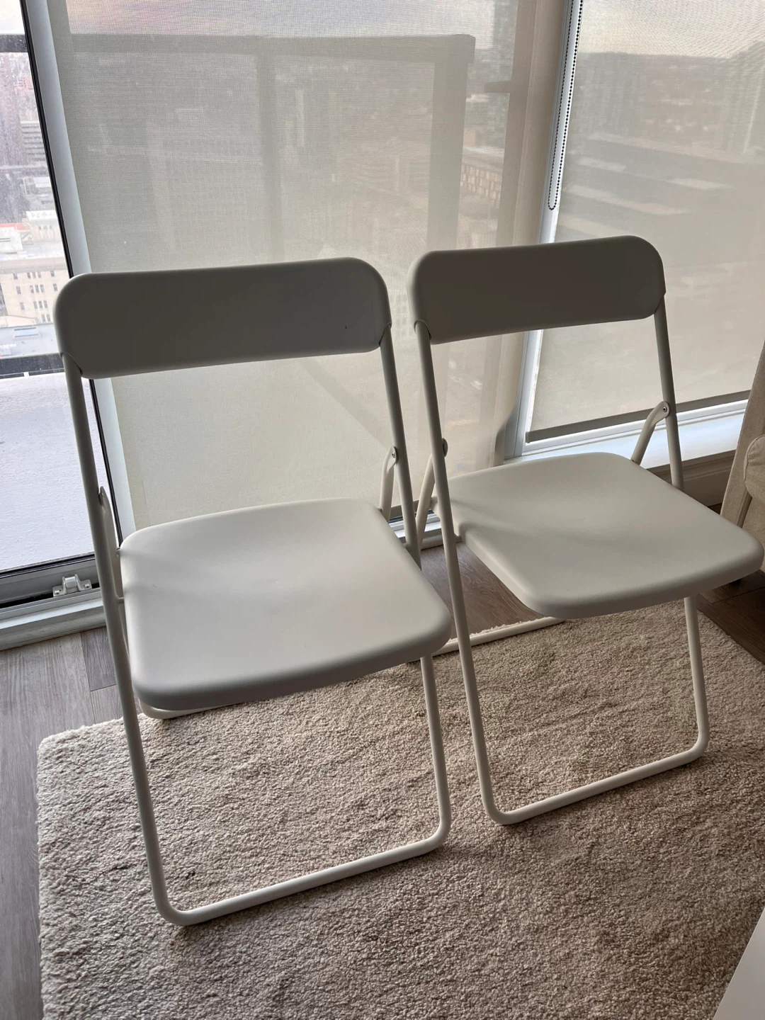 Pair of White Folding Chairs