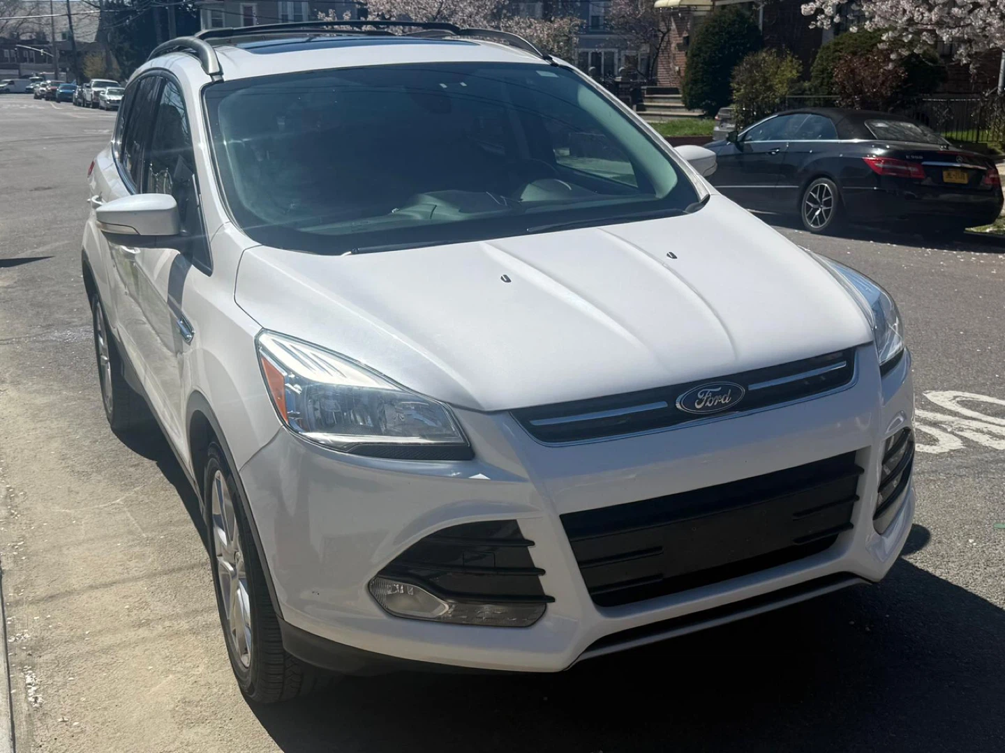 White Ford Escape SUV
