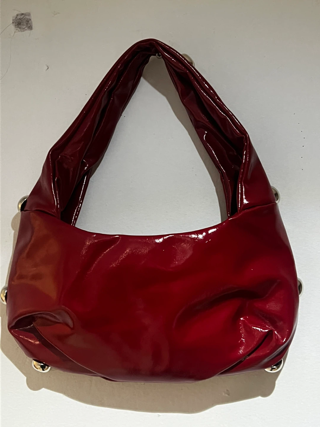 Red patent shoulder bag with silver studs - photo 2