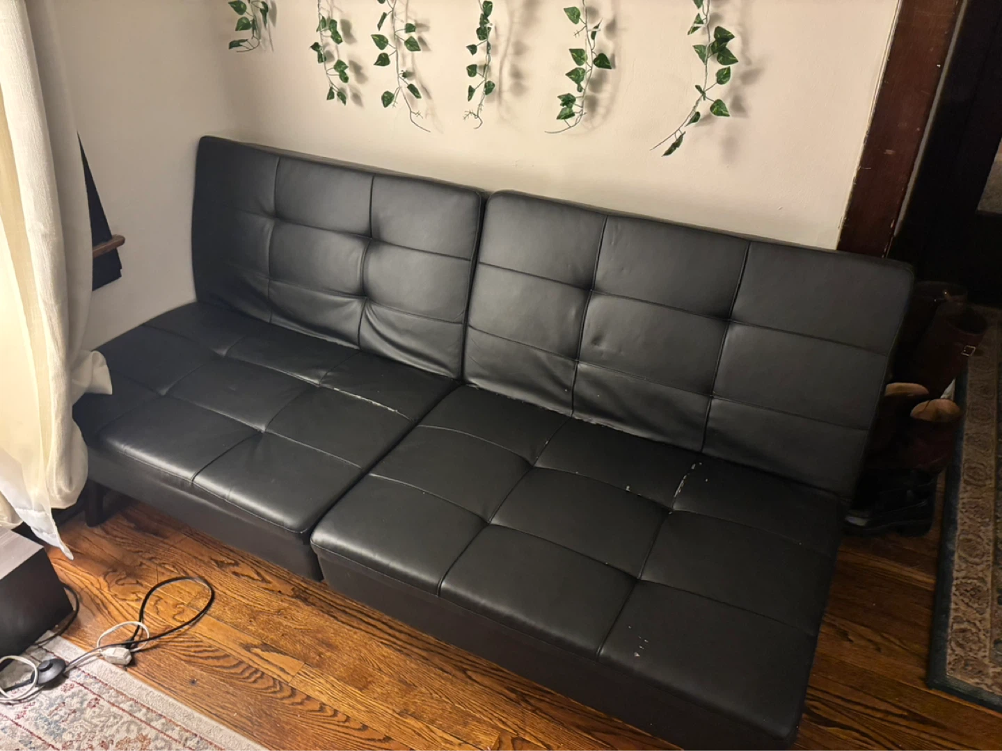 Black faux leather futon