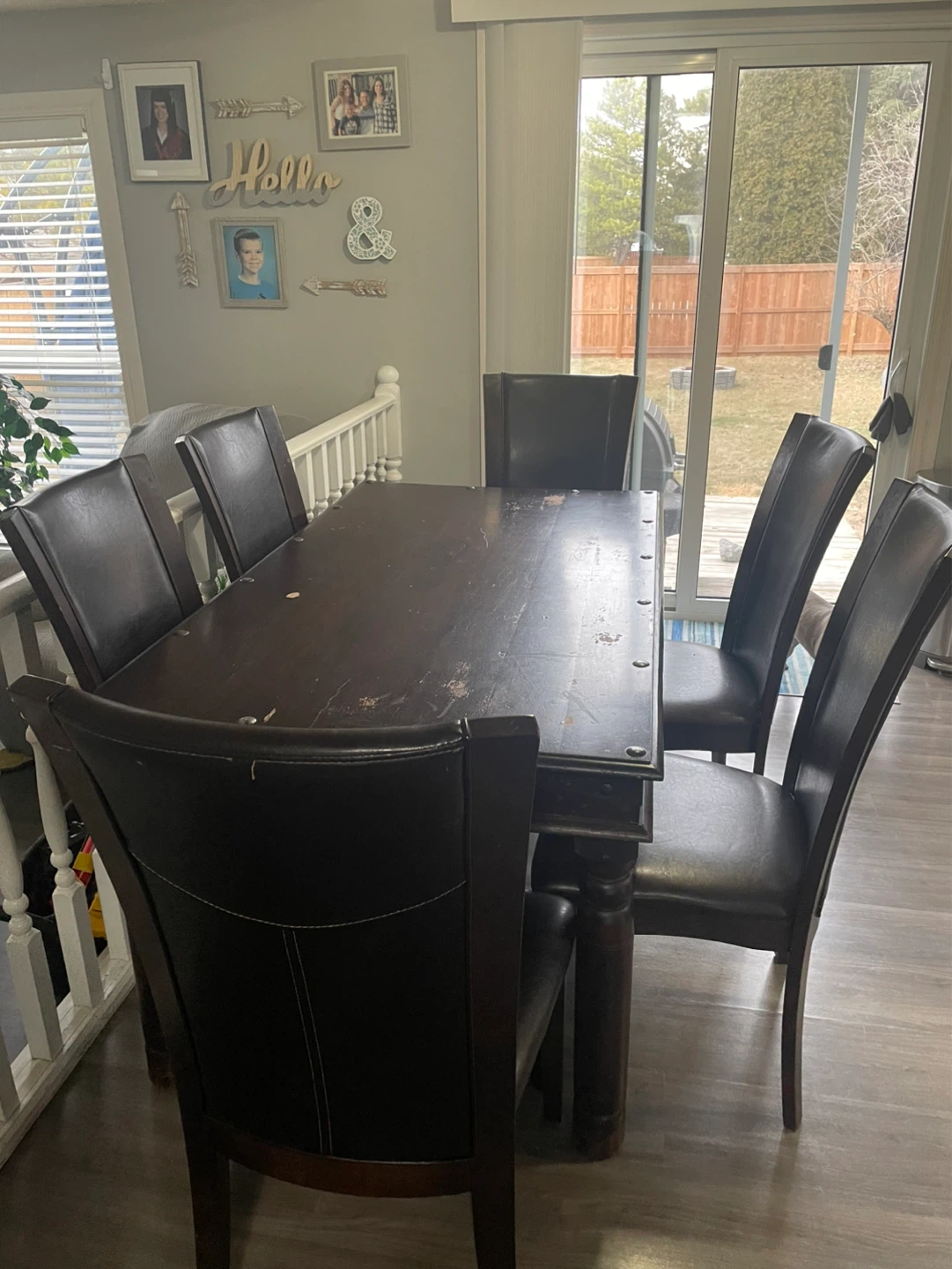Free Dark Wood Dining Table with 8  Faux Leather Chairs