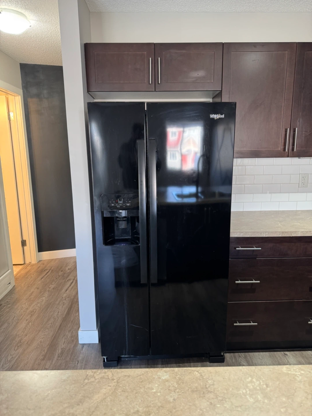 Whirlpool Side-by-Side Refrigerator with Ice and Water Dispenser