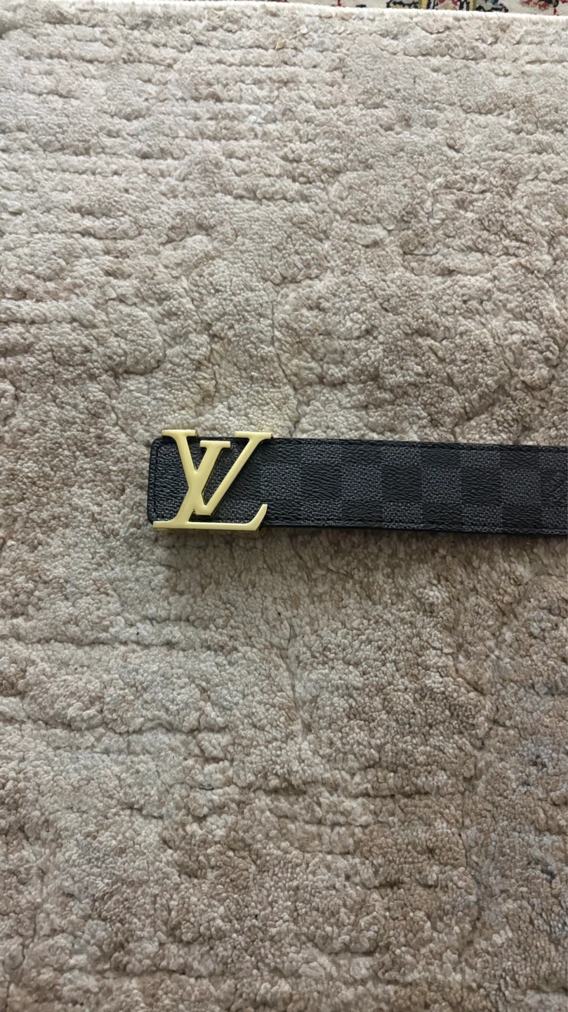 Black and gold lv belt