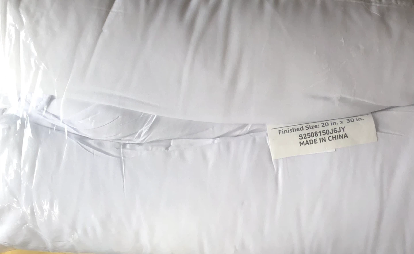 New in pack White Pillow 20" x 30"