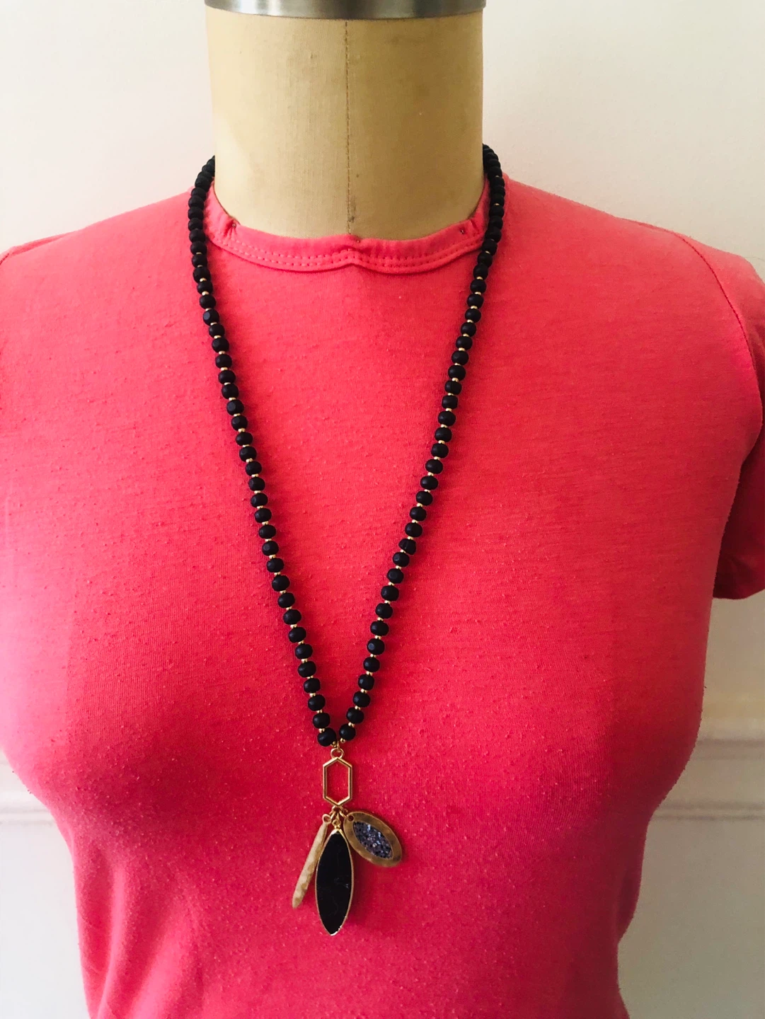 Black Beaded Pendant Necklace with Gold Accents