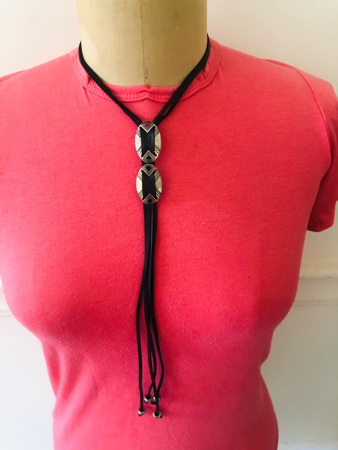 Black Leather Bolo Tie Necklace with Silver-Tone Oval Pendant