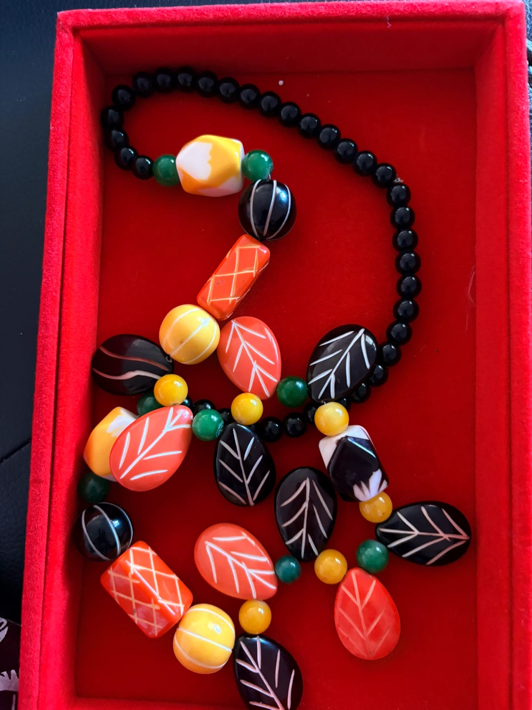 Beaded Necklace with Orange, Yellow, Black, and White Charms - photo 2