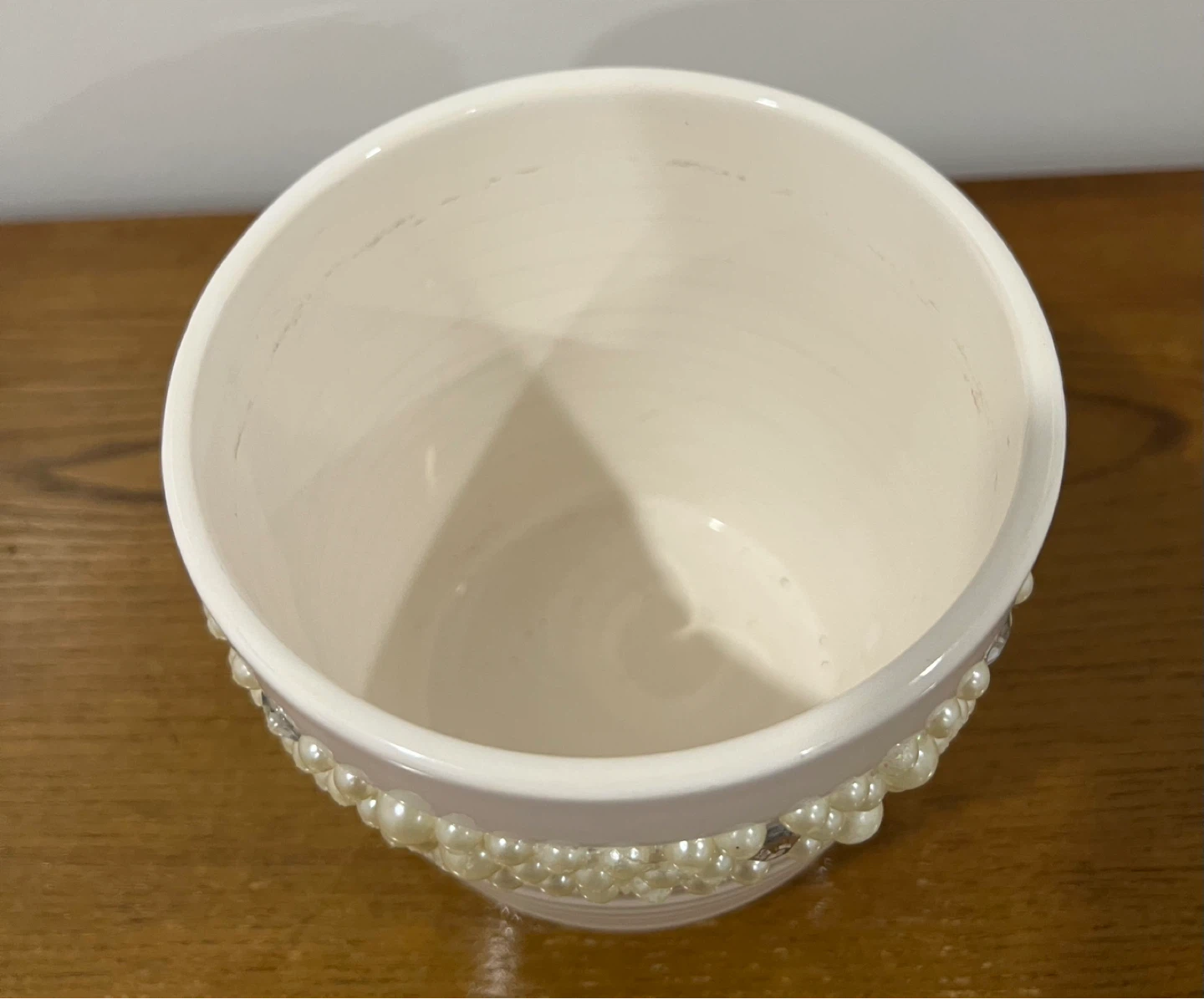 White ceramic pot with pearl and rhinestone embellishments