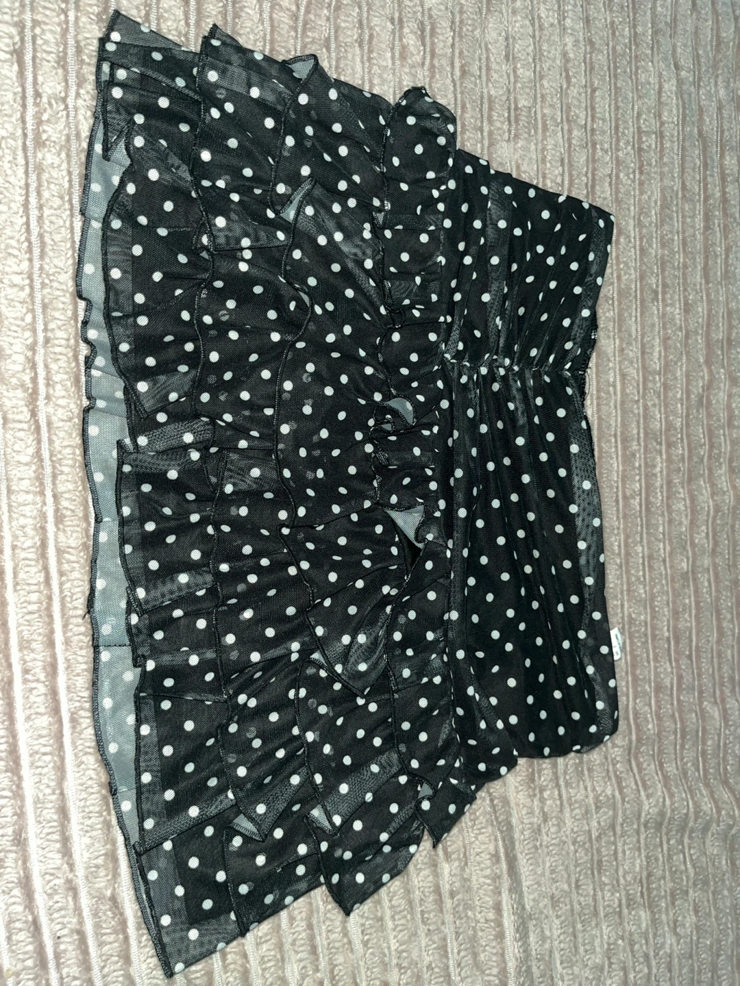 Black and white polka dot ruffled mini skirt