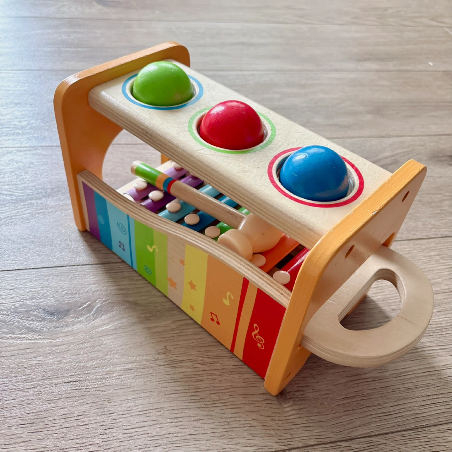 HAPE wooden tap and pound bench ball popper with xylophone