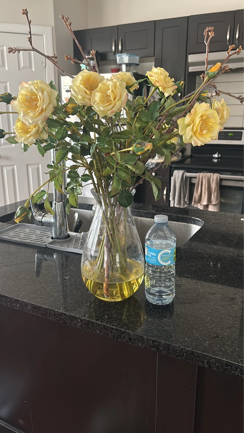 Artificial Yellow Roses in Glass Vase