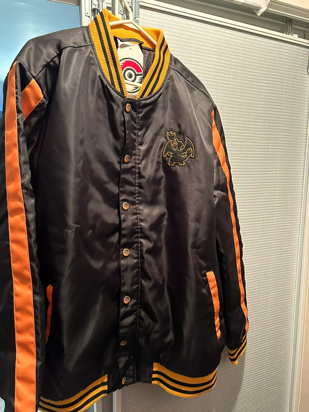 pokemon charizard varsity jacket