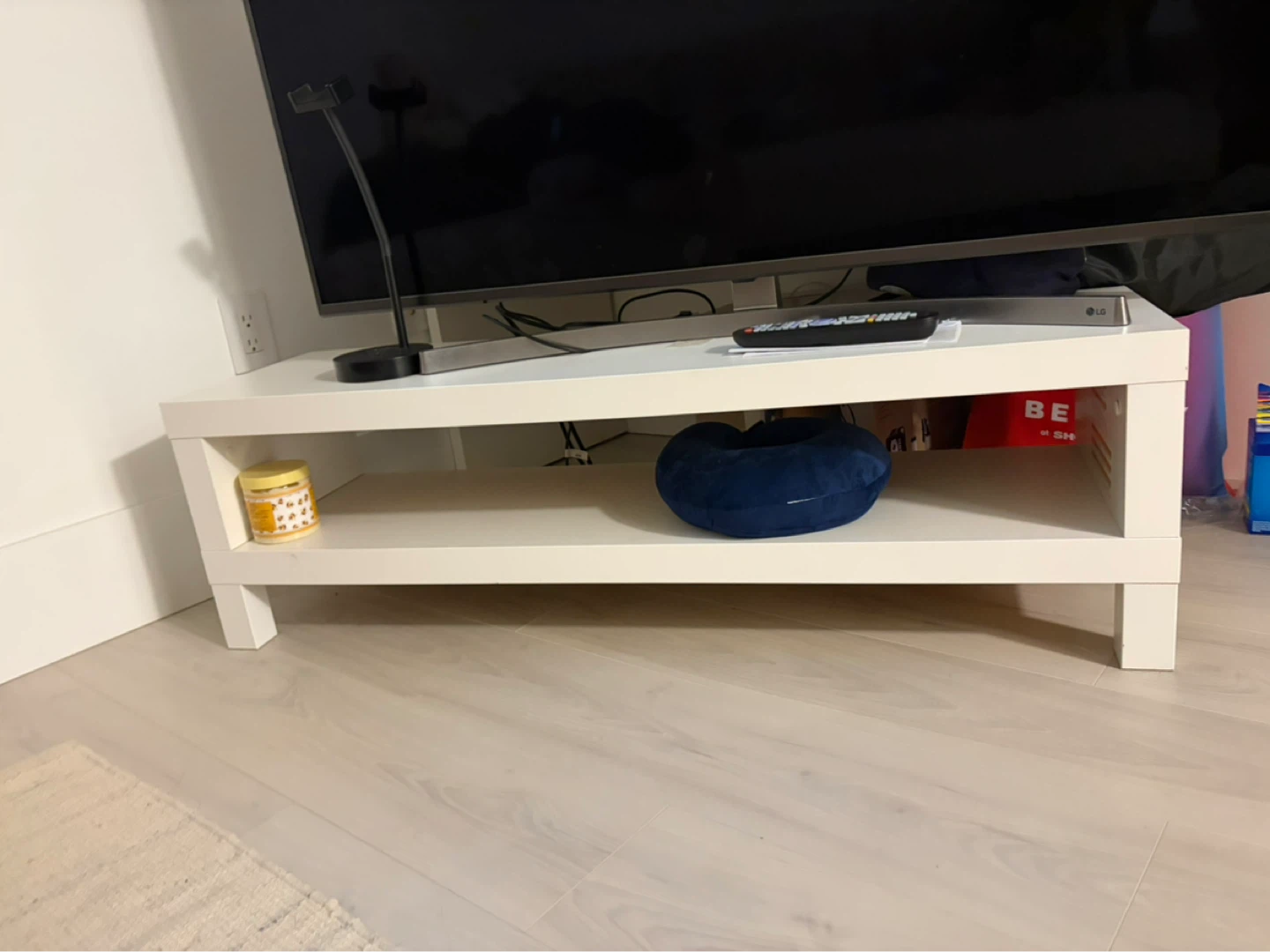 White TV Stand with Shelf