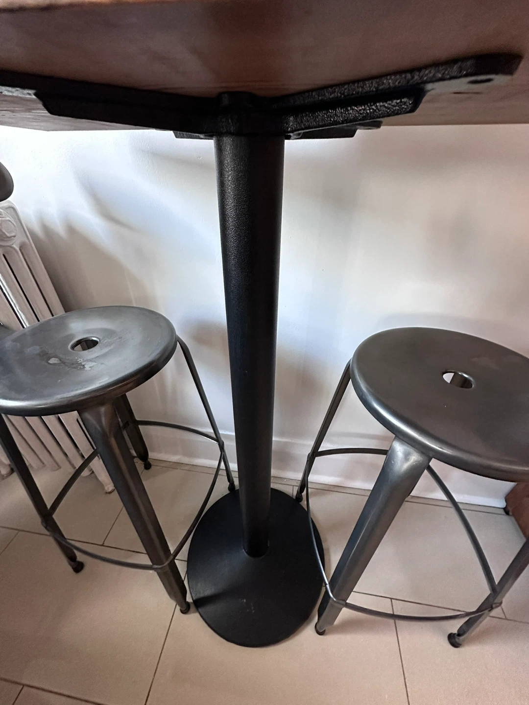 Rustic wood bar table with metal base & two bar stools