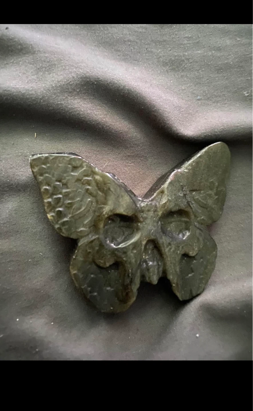 Carved Butterfly Skull Figurine