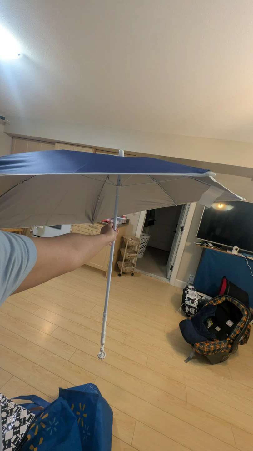 Clamp-on umbrella for wagon and stroller