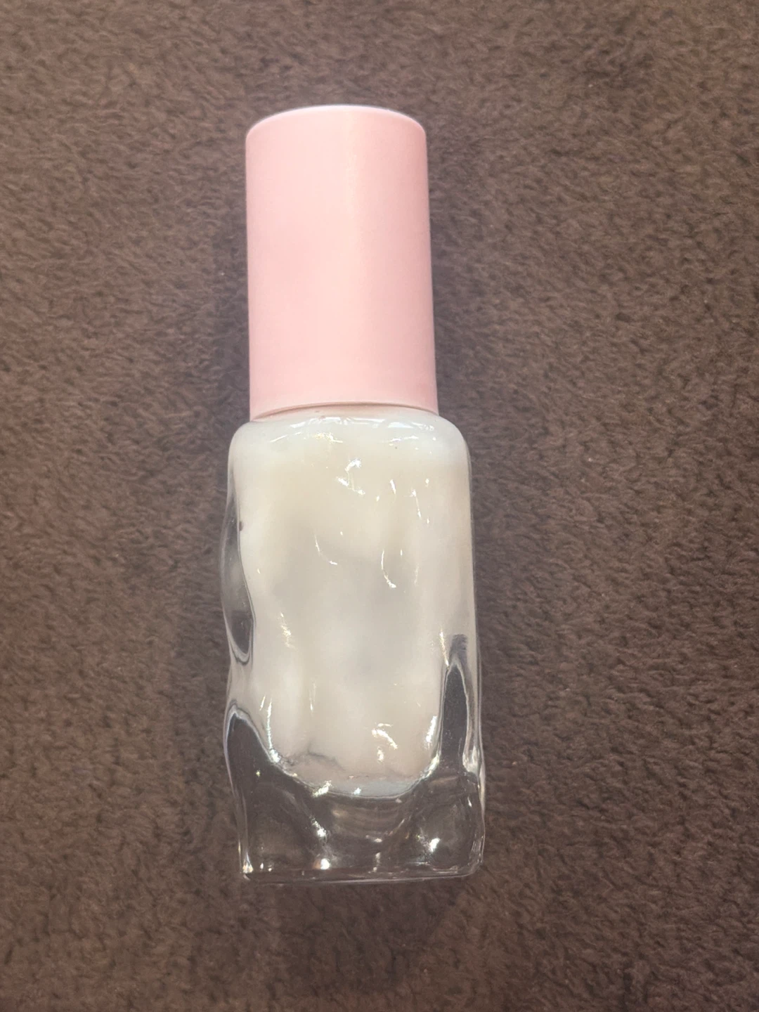 Glass bottle with hand moisturizer in it