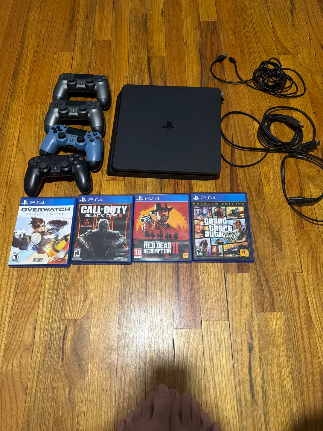 PlayStation 4 Slim Console with 4 Games and 4 Controllers