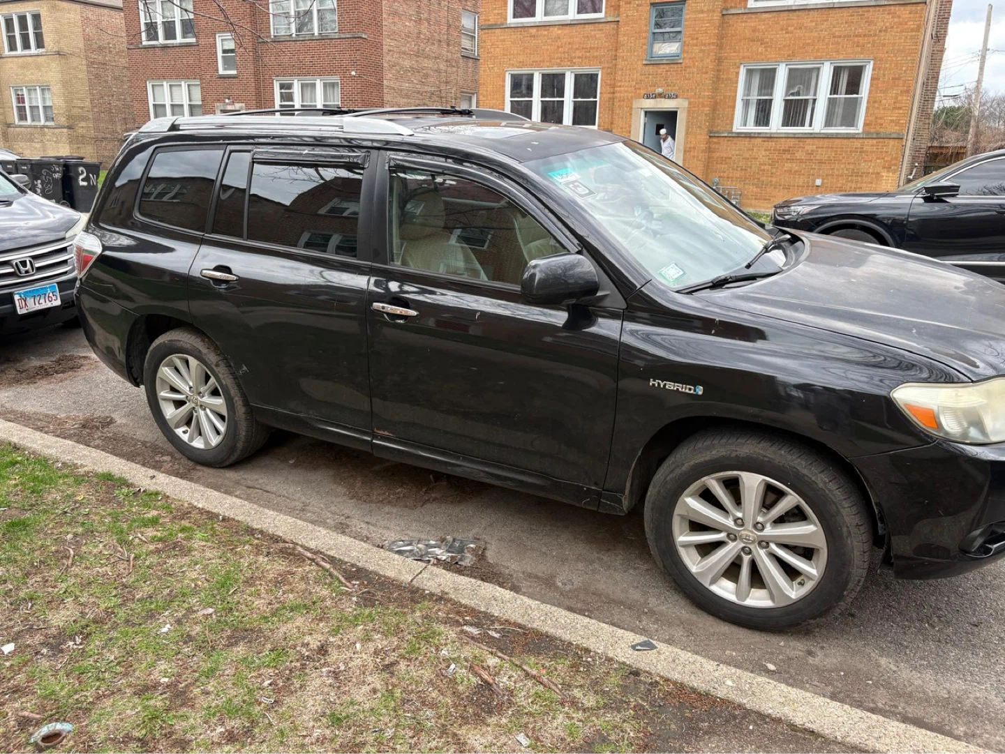 Black Toyota Highlander Hybrid SUV
