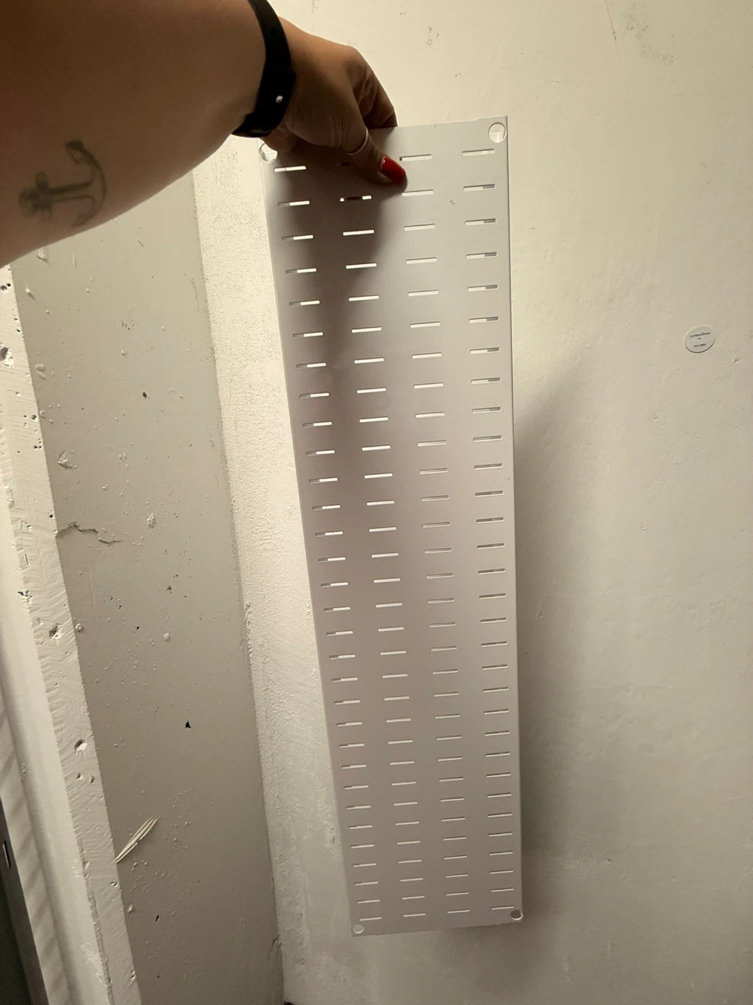 White pegboard panel - photo 2