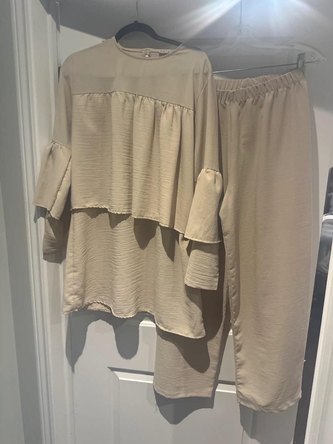 Two-piece beige tunic and pants set