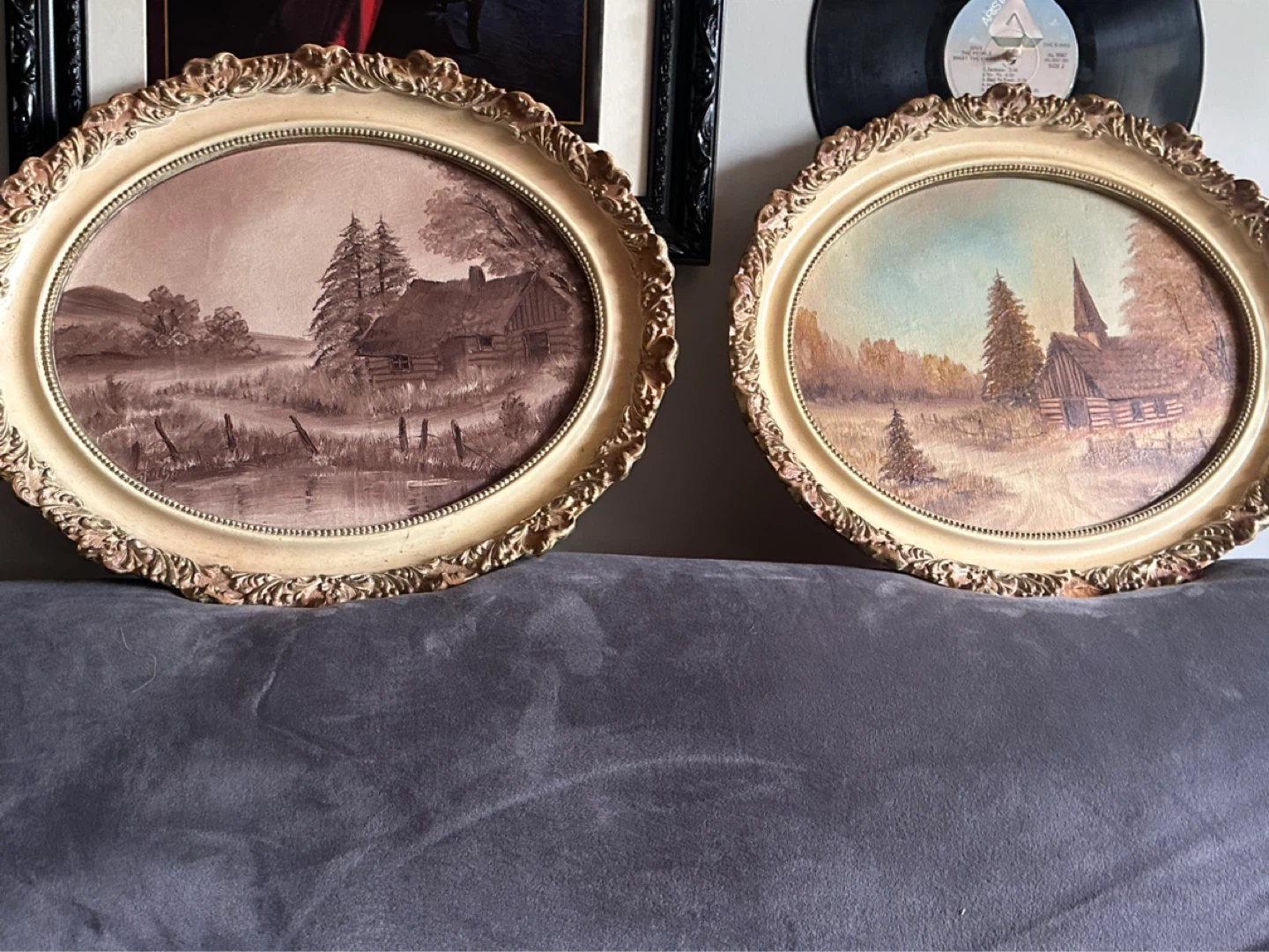 Pair of vintage signed oval oil paintings